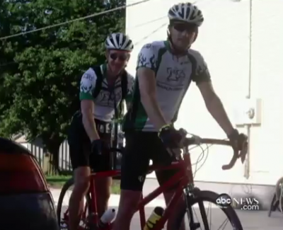 Dr. Jay Alberts and friend on his tandem bicycle