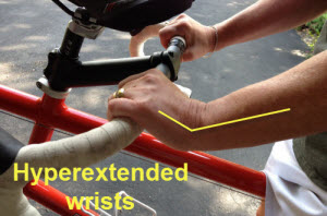 Hyperextended-Wrists-in a spinning class can lead-to-numbness-and-carpal tunnel-tingling-hands