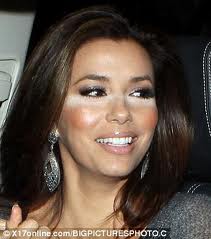 Eva's make up artist needs to be fired. Her concealer is WAY too light!